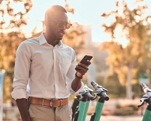 somalia young man on mobile phone